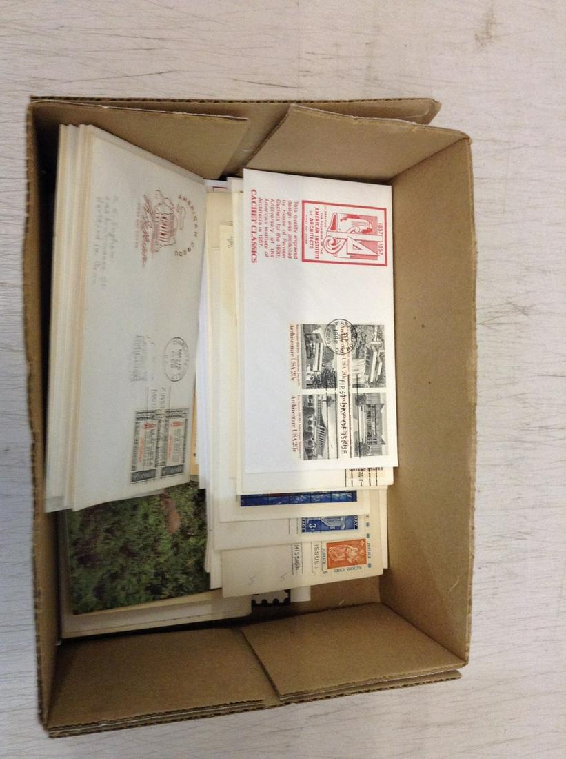 box full of first day covers and postcards (1 of 1)