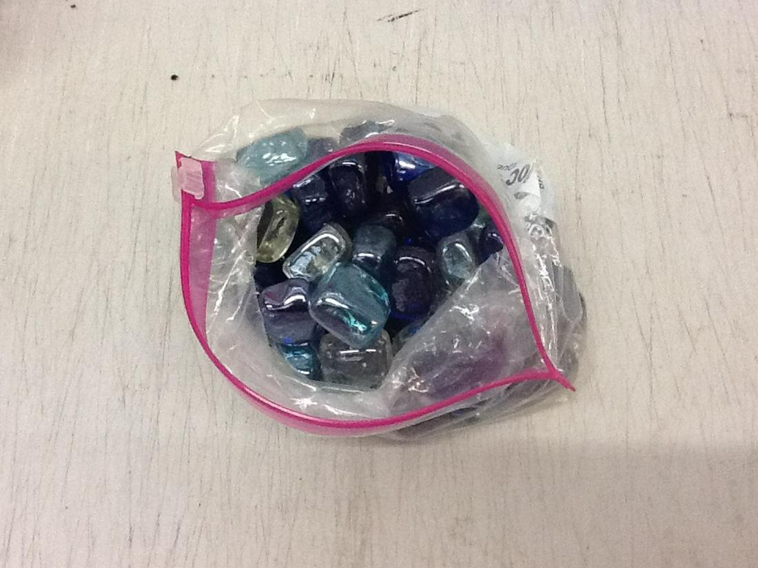 Bag full of decorative stones: Bag full of decorative stones