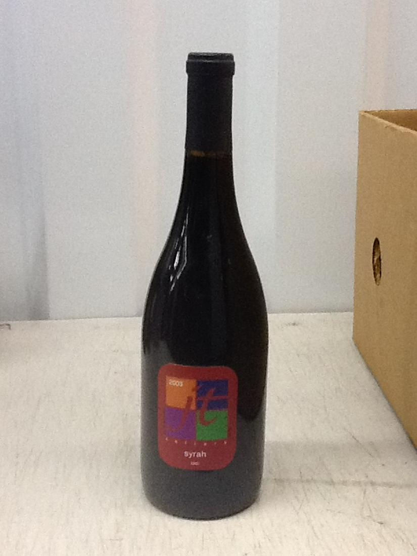 JT Cellars 2003 Syrah: Any contents in bottle is Free; You are bidding on the bottle & unbroken tax stamp