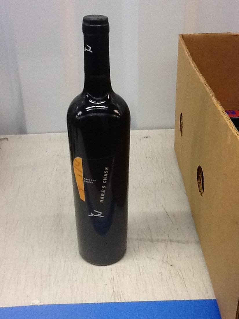 2002 Barossa Shiraz: Any contents in bottle is Free; You are bidding on the bottle & unbroken tax stamp