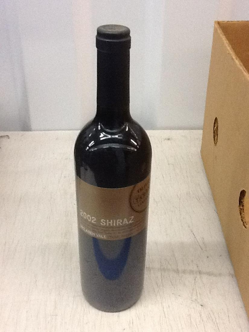 2002 Shiraz: Any contents in bottle is Free; You are bidding on the bottle & unbroken tax stamp