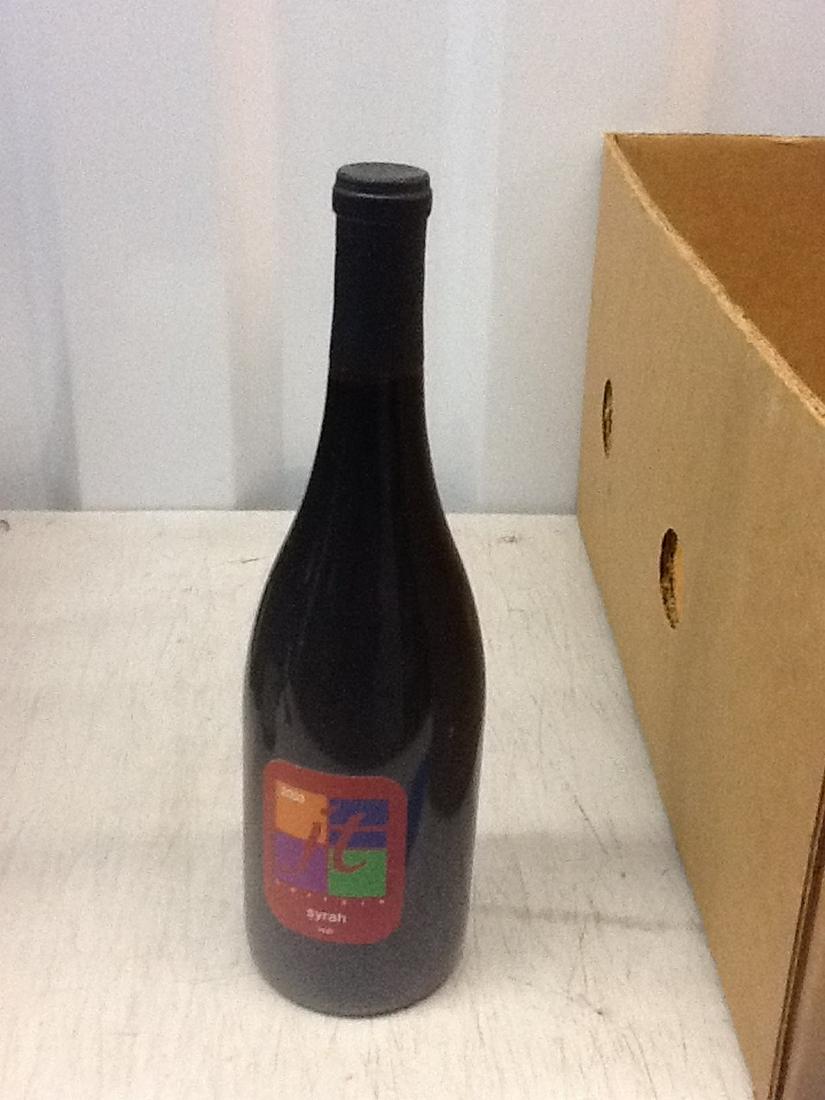 2003 JT Cellars Syrah: Any contents in bottle is Free; You are bidding on the bottle & unbroken tax stamp