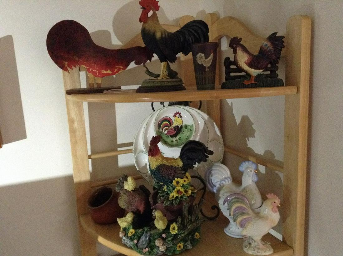 Two shelves with rooster items: Two shelves with rooster items