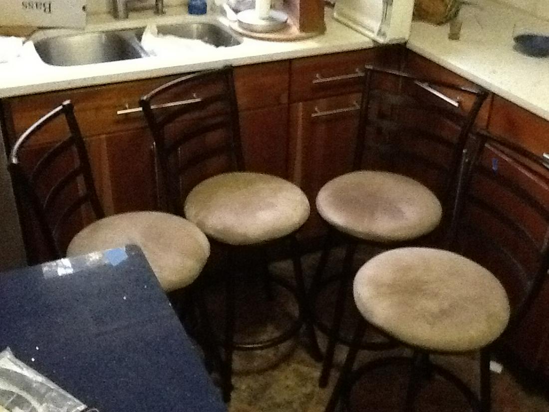 four metal counter-top chairs: four metal counter-top chairs