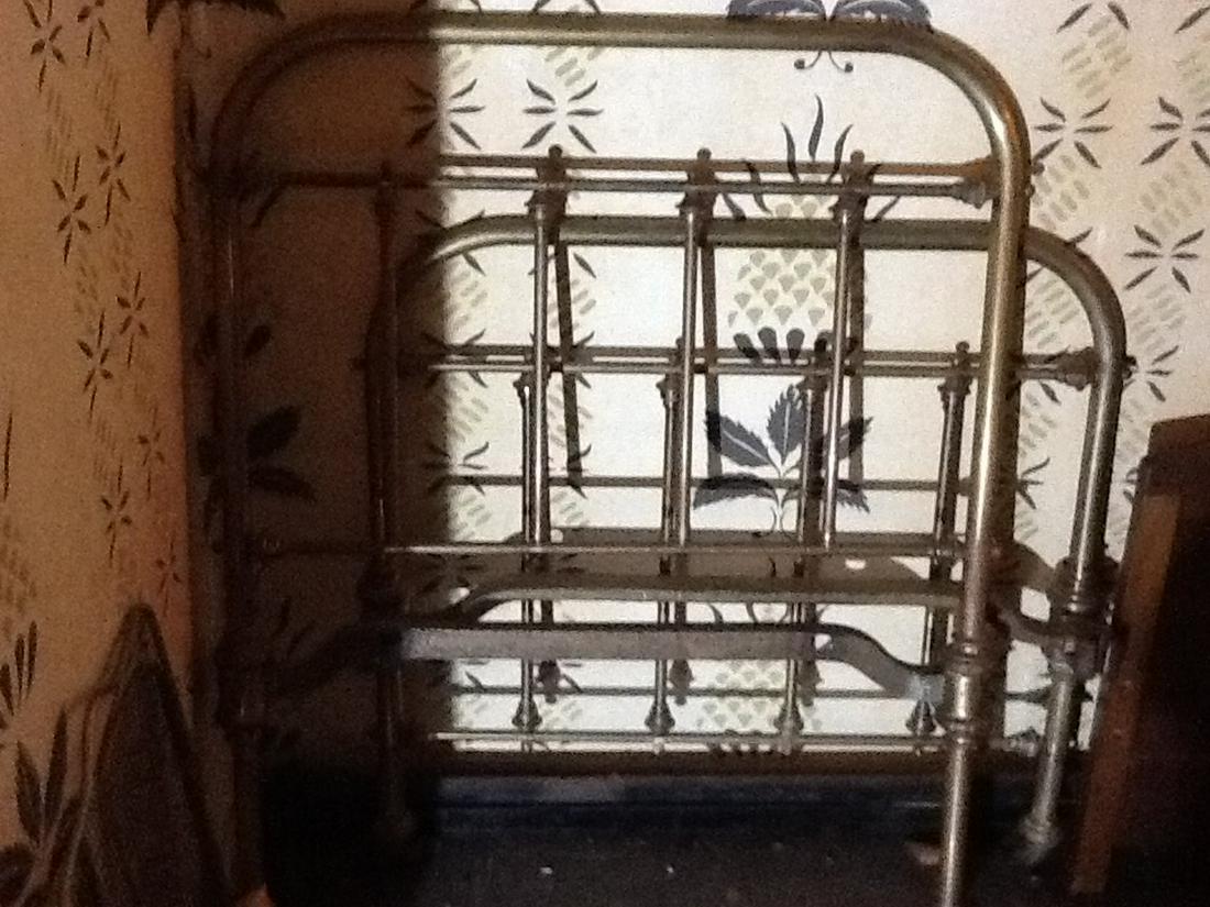 twin brass head and footboard: twin brass head and footboard