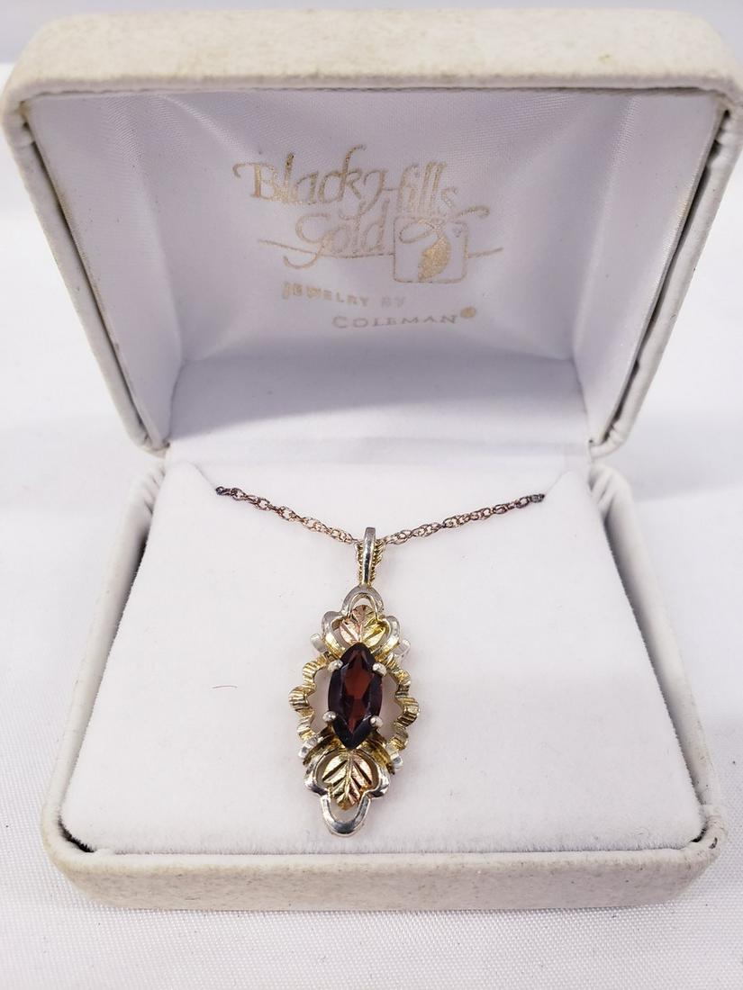 Black Hills Gold necklace with Ruby pendant marked (1 of 1)