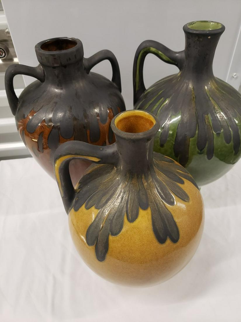 Set of three pottery vases - the red one has a chip on (1 of 1)