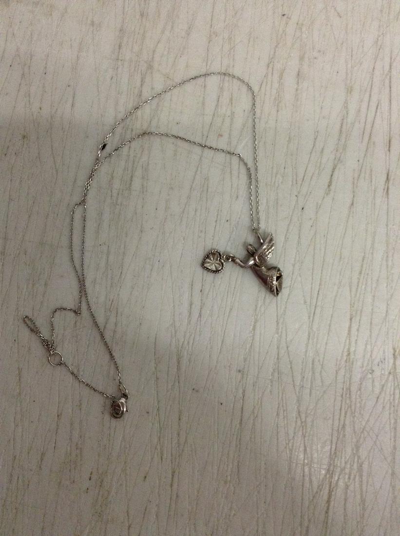 Sterling silver angel necklace with dangle heart: Sterling silver angel necklace with dangle heart