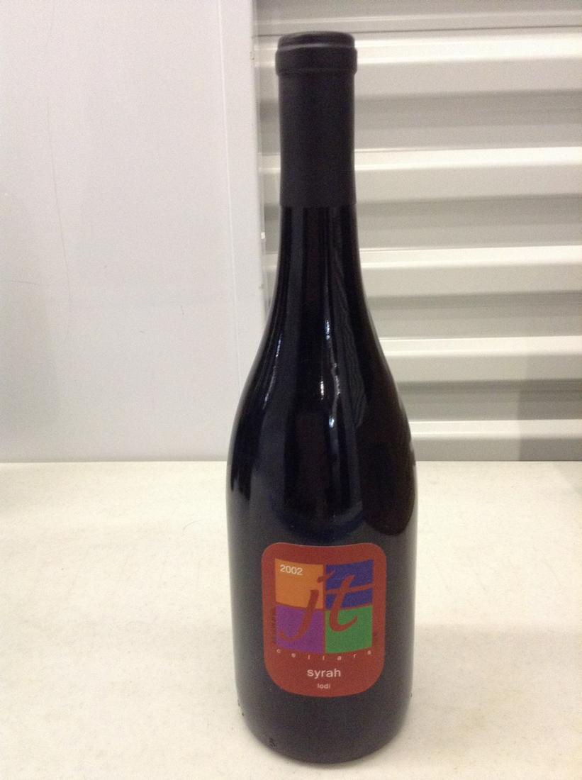 Syrah Iodi 2003 750 ml: Any contents in bottle is Free; You are bidding on the bottle & unbroken tax stamp