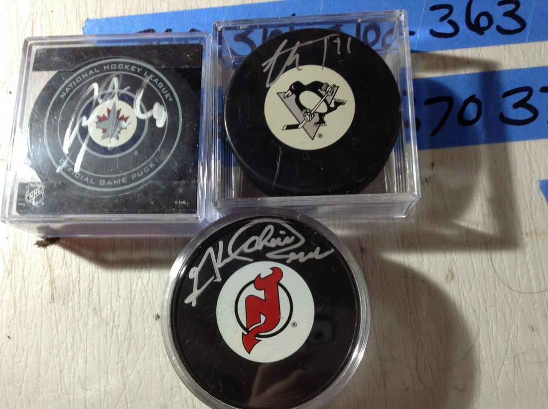 lot of autographed Hockey pucks: lot of autographed Hockey pucks