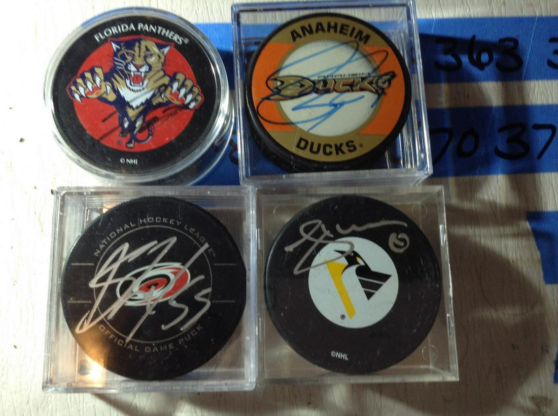lot of autographed Hockey Pucks: lot of autographed Hockey Pucks