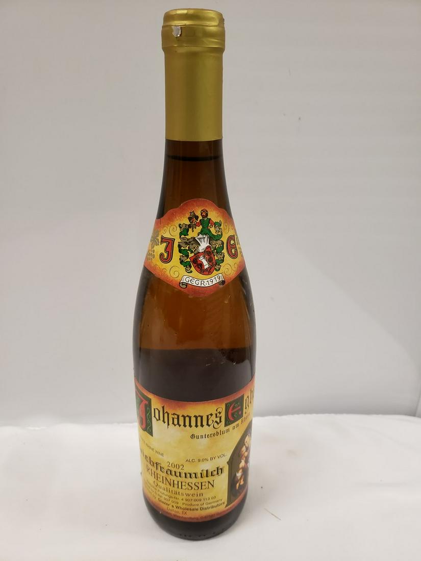Bottle of German wine - selling bottle contents are: Any contents in bottle is Free; You are bidding on the bottle & unbroken tax stamp
