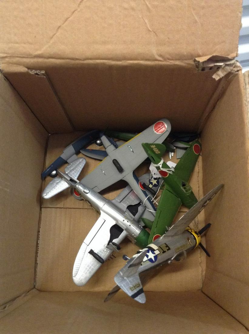 Box of vintage model airplanes: Box of vintage model airplanes