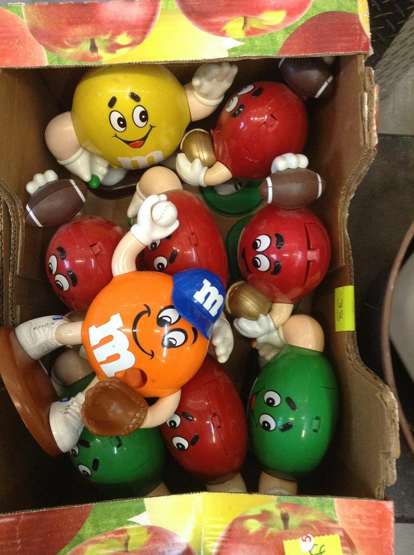 box full of m and m dispensers: box full of m and m dispensers