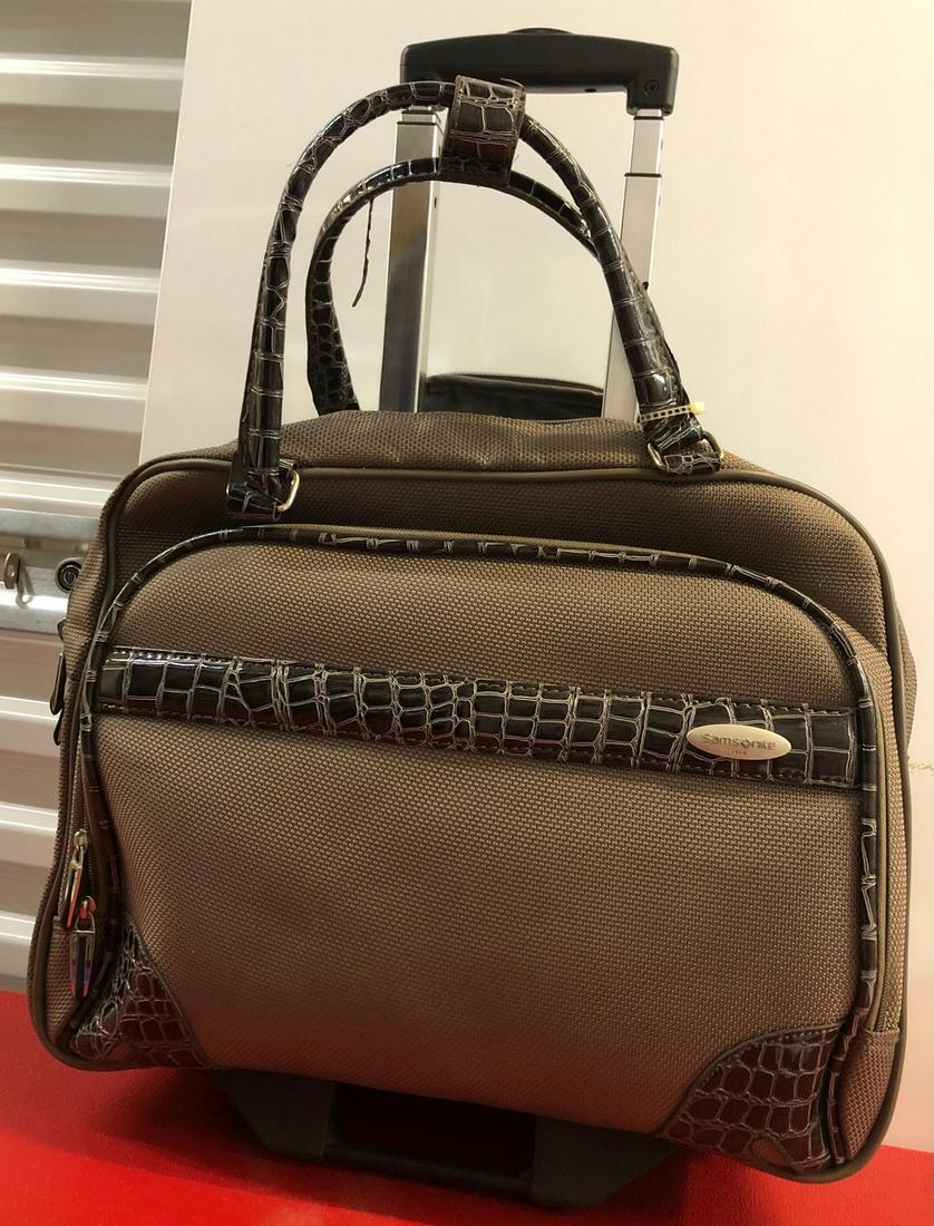 Samsonite luggage- Brown Retracting Handle, 19": Samsonite luggage- Brown Retracting Handle, 19"