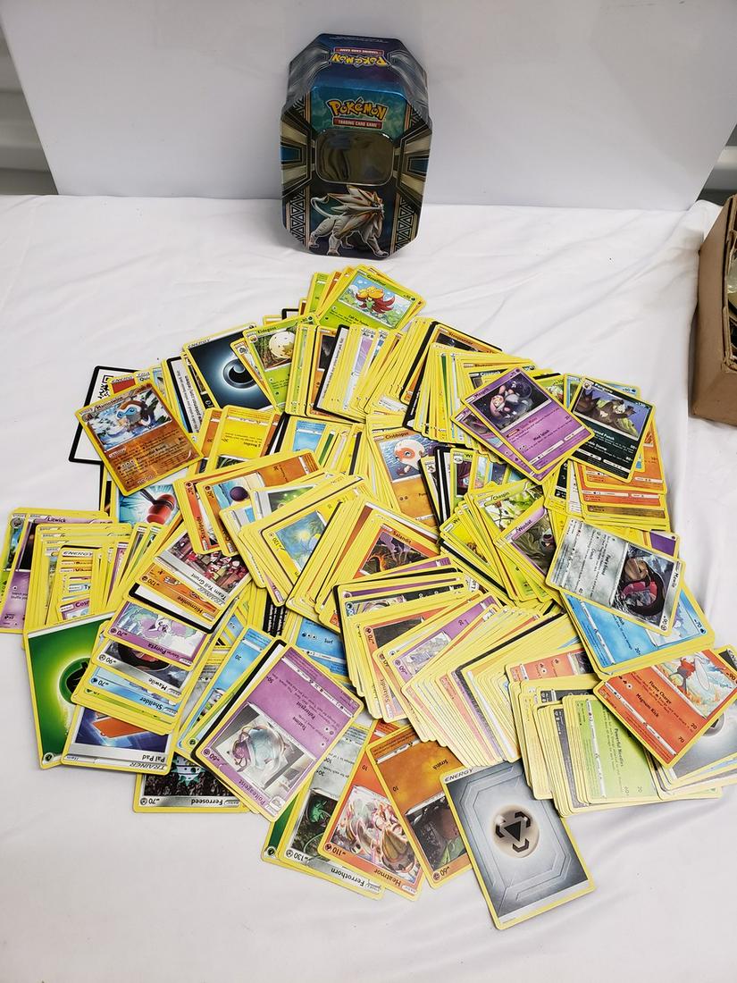 Large lot of Pokemon cards - includes a tin (1 of 1)