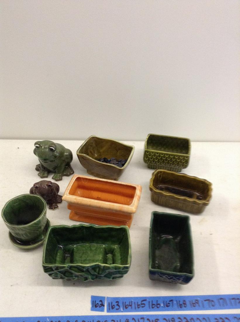 large amount of various size planters and yard frogs (1 of 1)