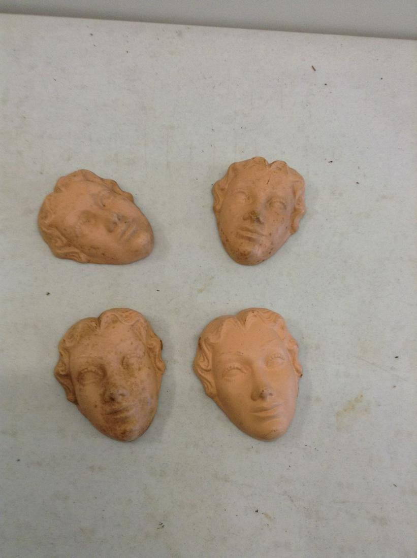 lot of four plaster faces: 4x4