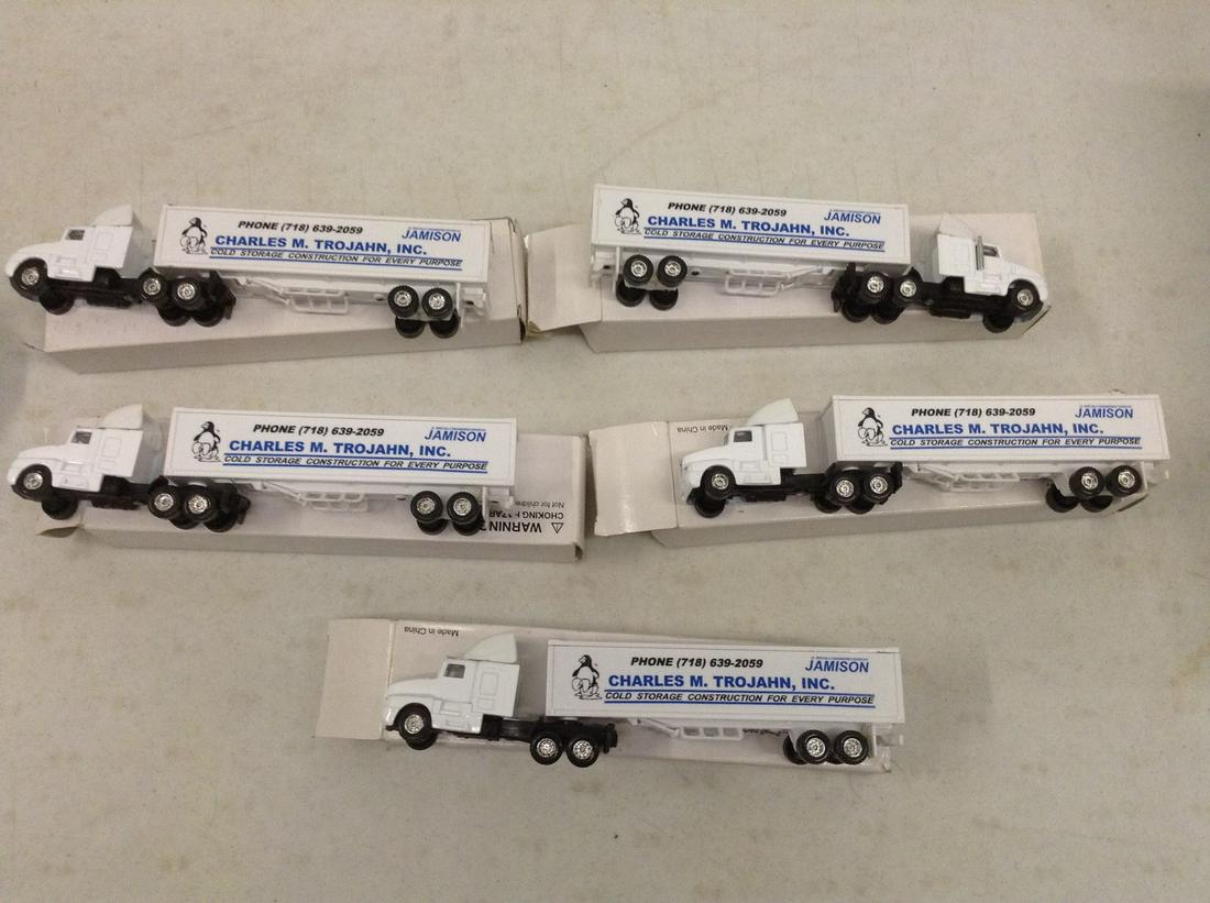 lot of five charles m trojan diecast trucks (1 of 1)