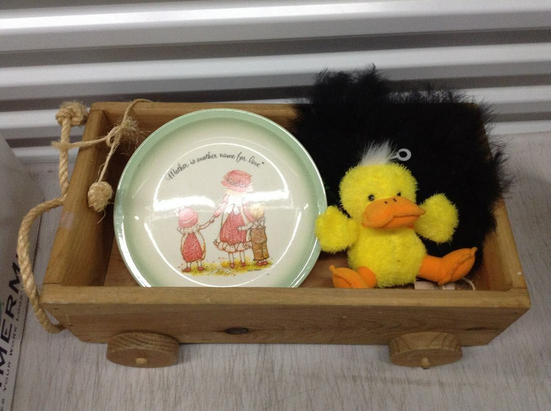 Mask, Plush Duck, Mother Plate, and Wooden Crate on: Mask, Plush Duck, Mother Plate, and Wooden Crate on Wheels