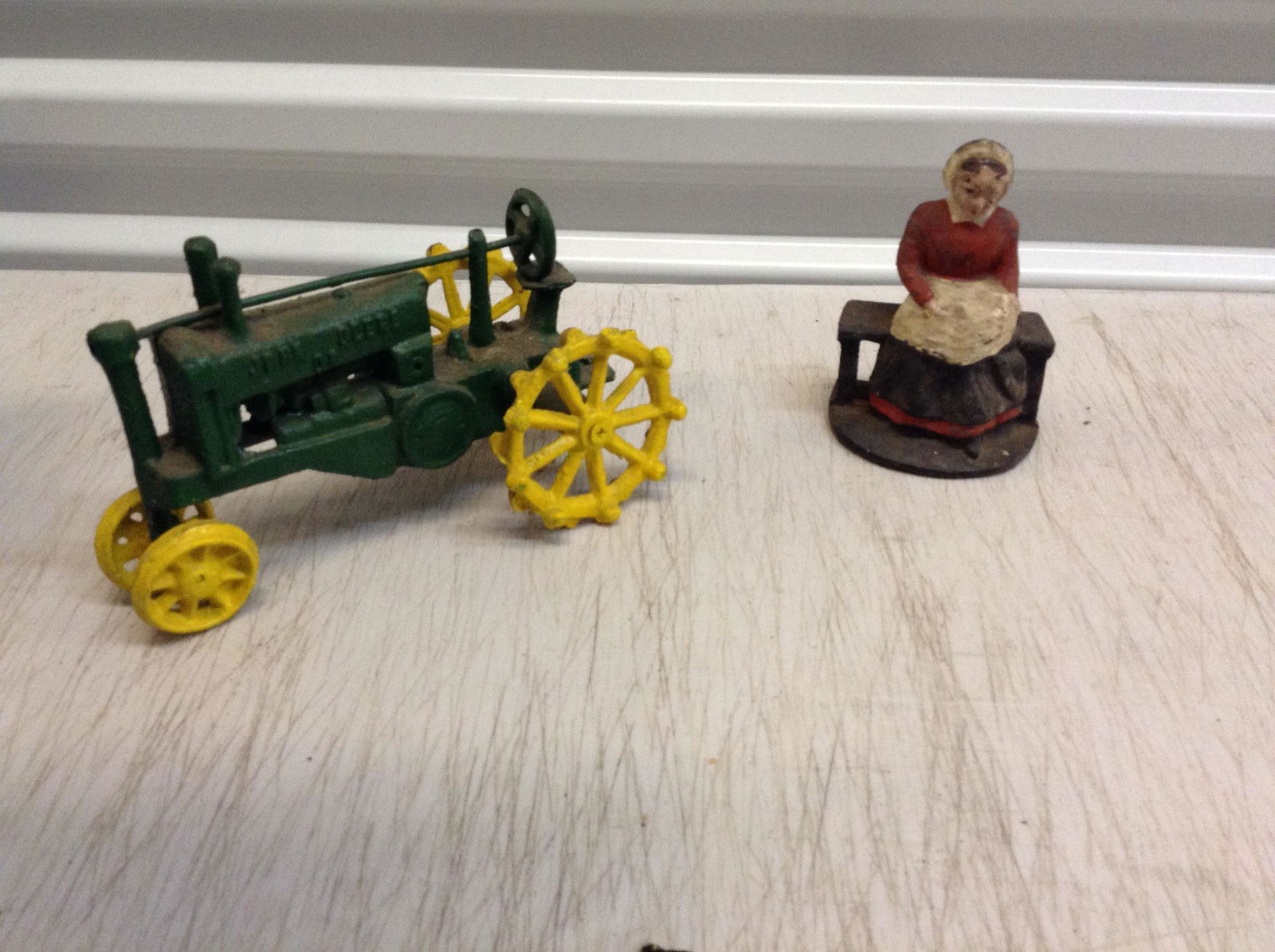 vintage cast iron tractor and woman (1 of 1)