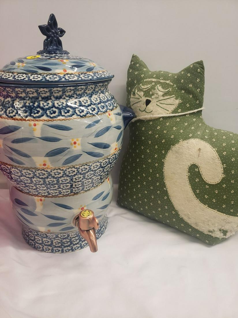 Heavy pottery liquid dispenser and weighted cat door: Heavy pottery liquid dispenser and weighted cat door stopper