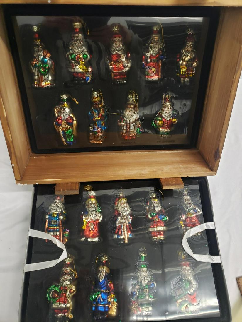 Lot of glass santas from around the world in wooden: Lot of glass santas from around the world in wooden crate