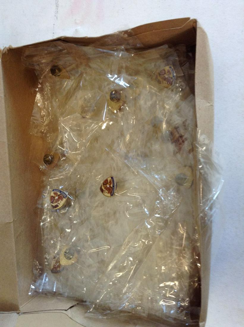 Box full of Desert Storm lapel pins: Box full of Desert Storm lapel pins