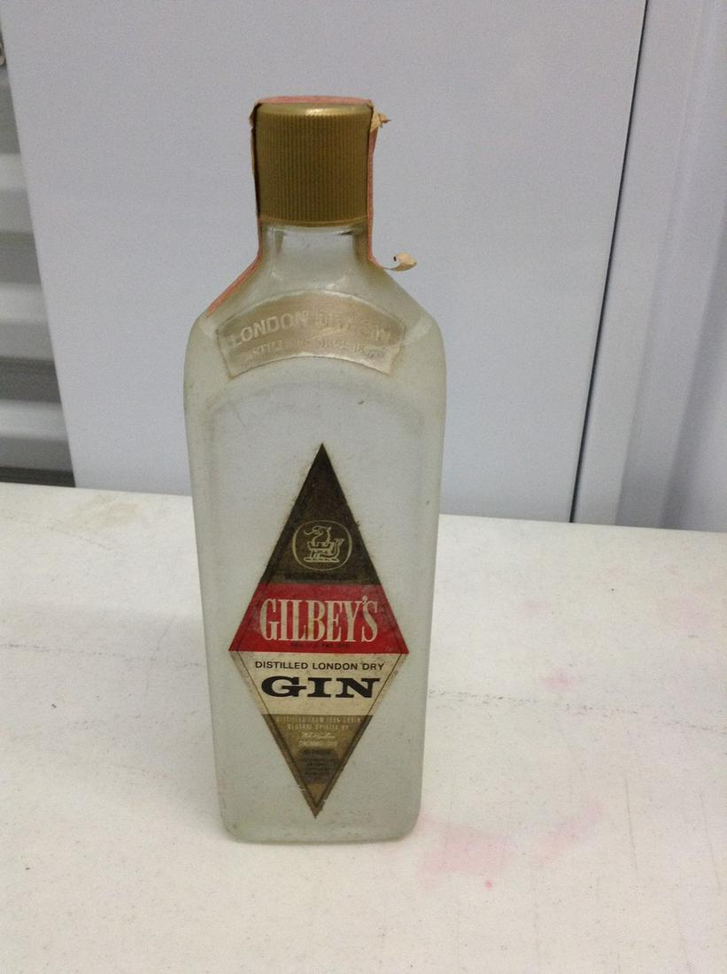 Gilbey's Distilled London Dry Gin Paper Label: Any contents in bottle is Free; You are bidding on the bottle & unbroken tax stamp