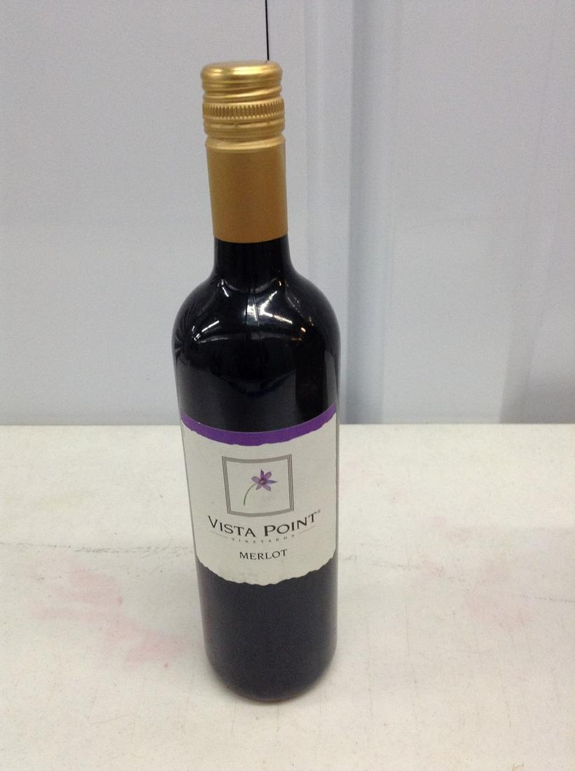 Vista Point Merlot: Any contents in bottle is Free; You are bidding on the bottle & unbroken tax stamp