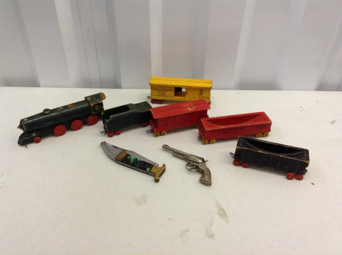Wooden trains, toy gun and more: Wooden trains, toy gun and more