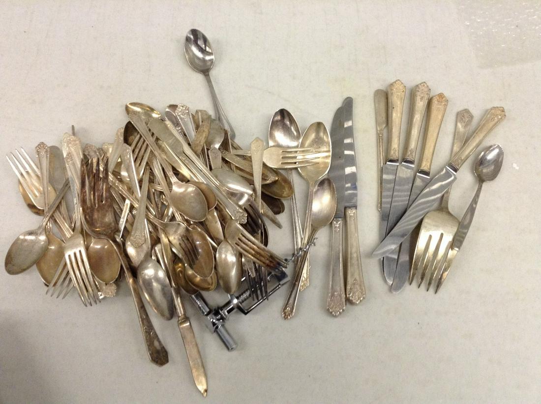 Large Amount of Silver Plated Utensils: Large Amount of Silver Plated Utensils