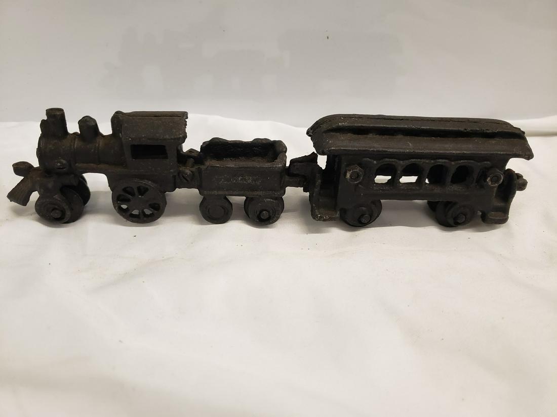 Cast Iron toy train and car Feb 28, 2021 Emanon Auctions and Estate