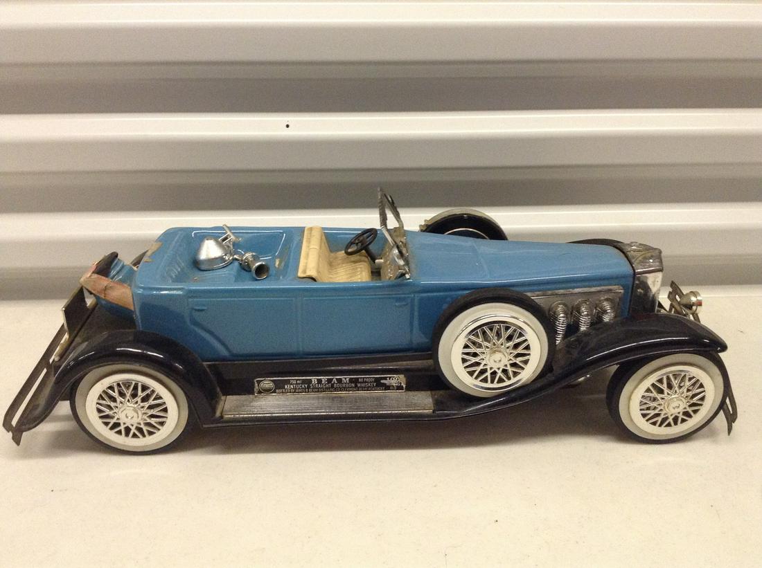 Full Vintage Jim Beam Decanter: Any contents in bottle is Free; You are bidding on the bottle & unbroken tax stamp