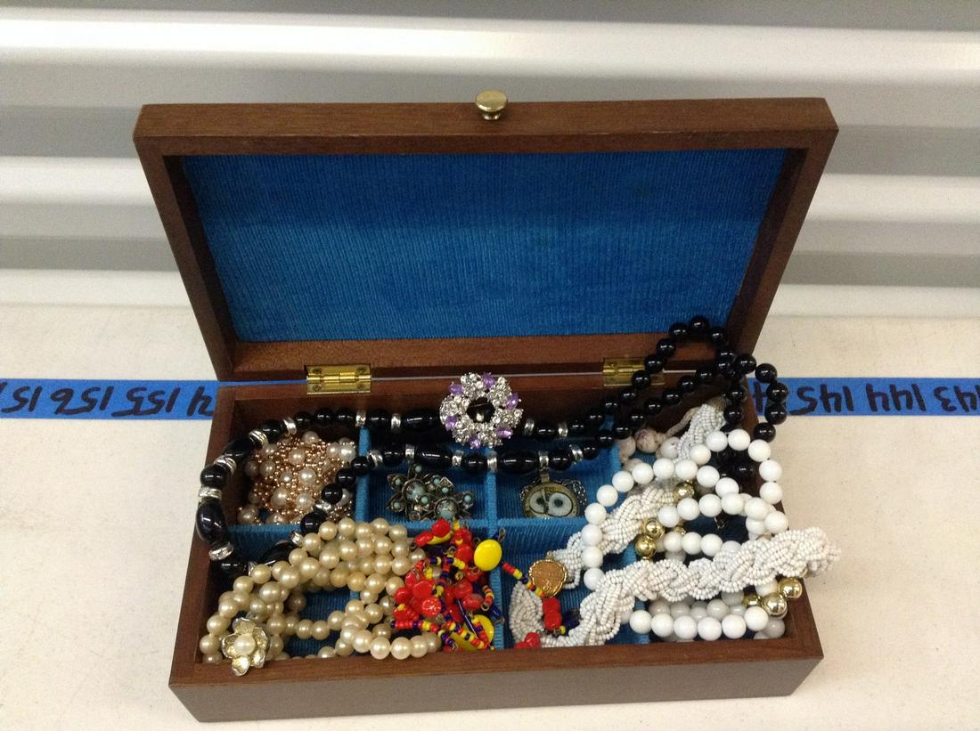Jewelry box full of vintage costume jewelry: Jewelry box full of vintage costume jewelry