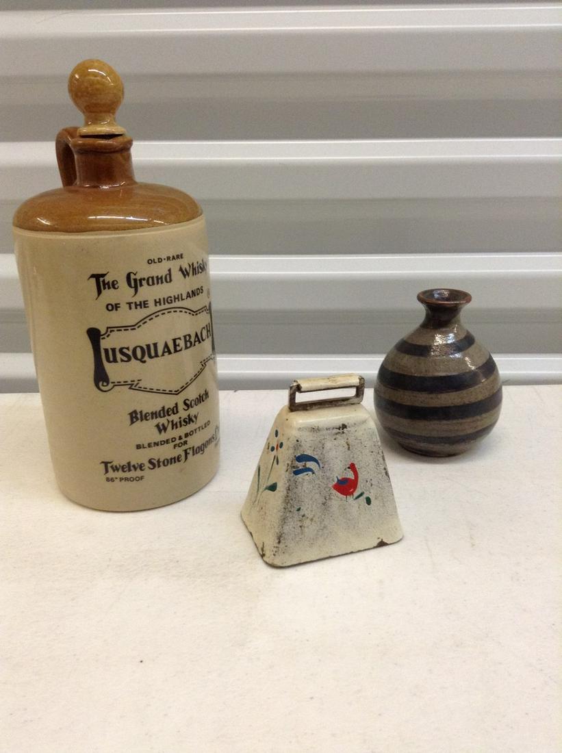 Stoneware whiskey jug, cowbell and more: Stoneware whiskey jug, cowbell and more