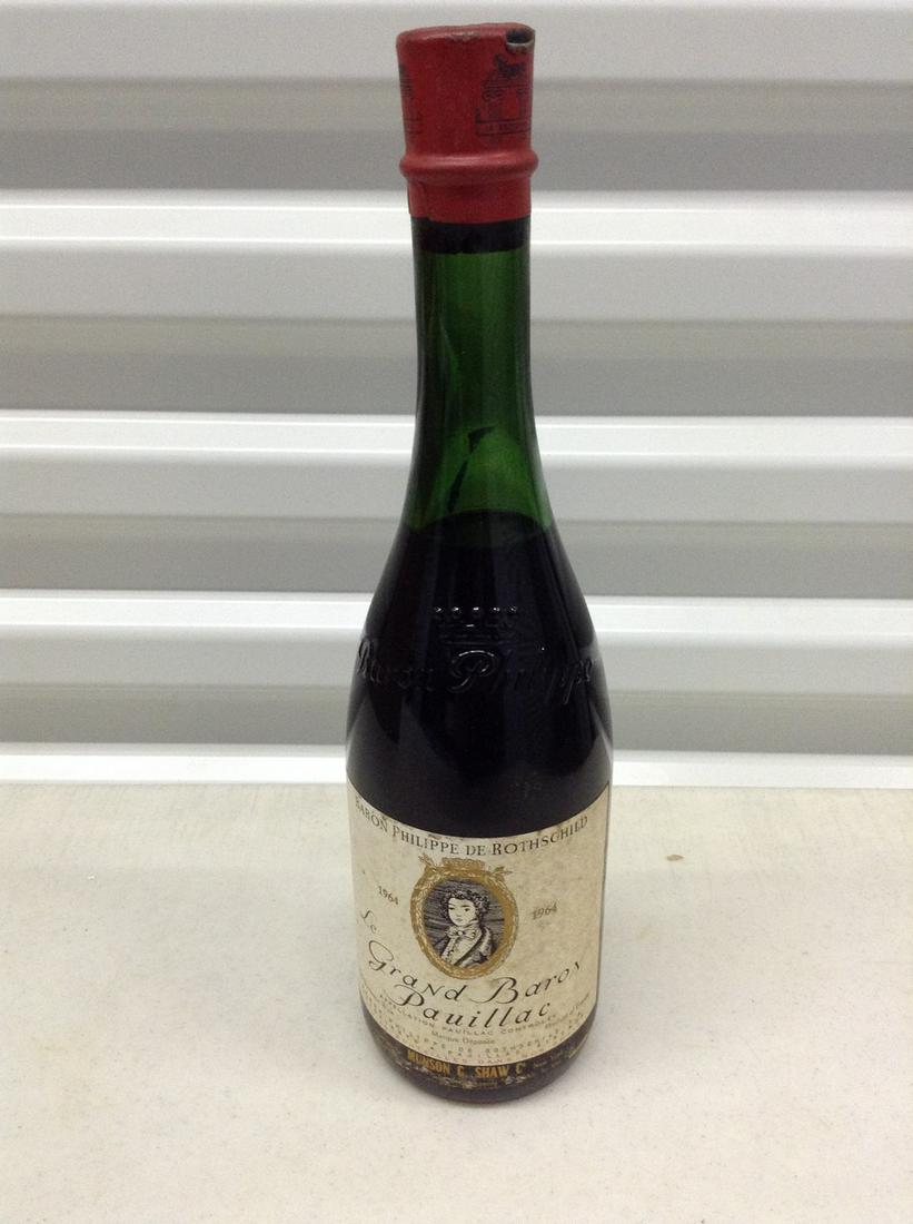 1964 Le Grand Baron Pauillac: Any contents in bottle is Free; You are bidding on the bottle & unbroken tax stamp