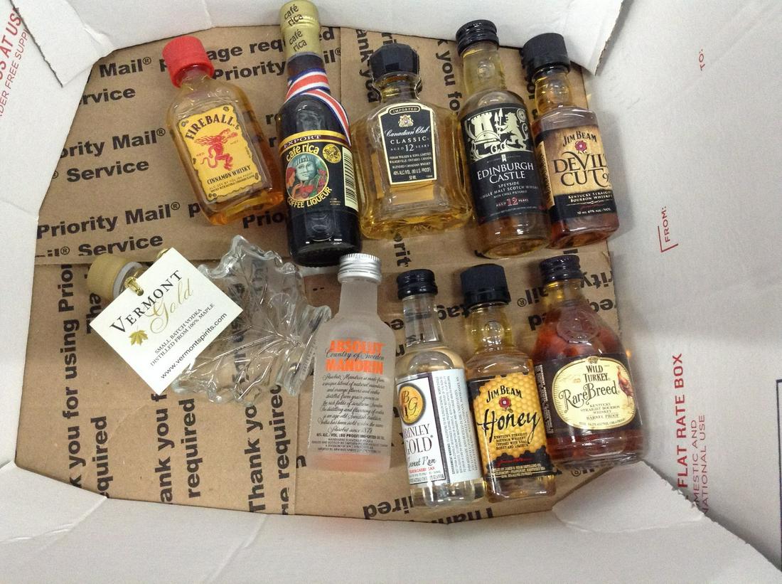 Box of liquor bottles: Any contents in bottle is Free; You are bidding on the bottle & unbroken tax stamp