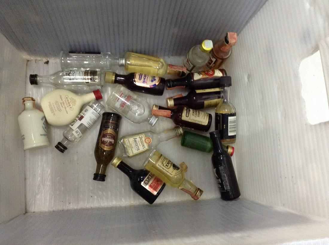 Lot of liquor bottles some unbroken tax seals: Any contents in bottle is Free; You are bidding on the bottle & unbroken tax stamp