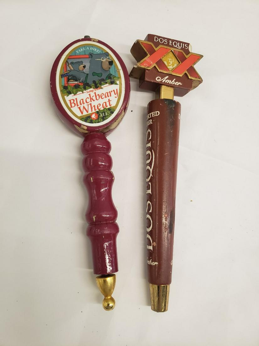two beer taps - Dos Equis, Blackbeary wheat: two beer taps - Dos Equis, Blackbeary wheat