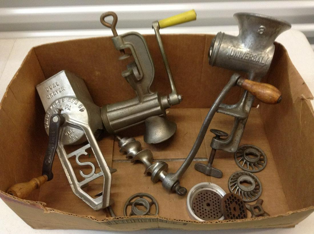 Box full of vintage meat grinders and accessories (1 of 1)