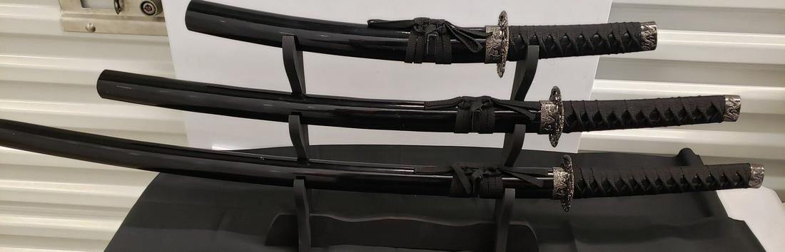 Lot of 3 swords with stand (1 of 1)