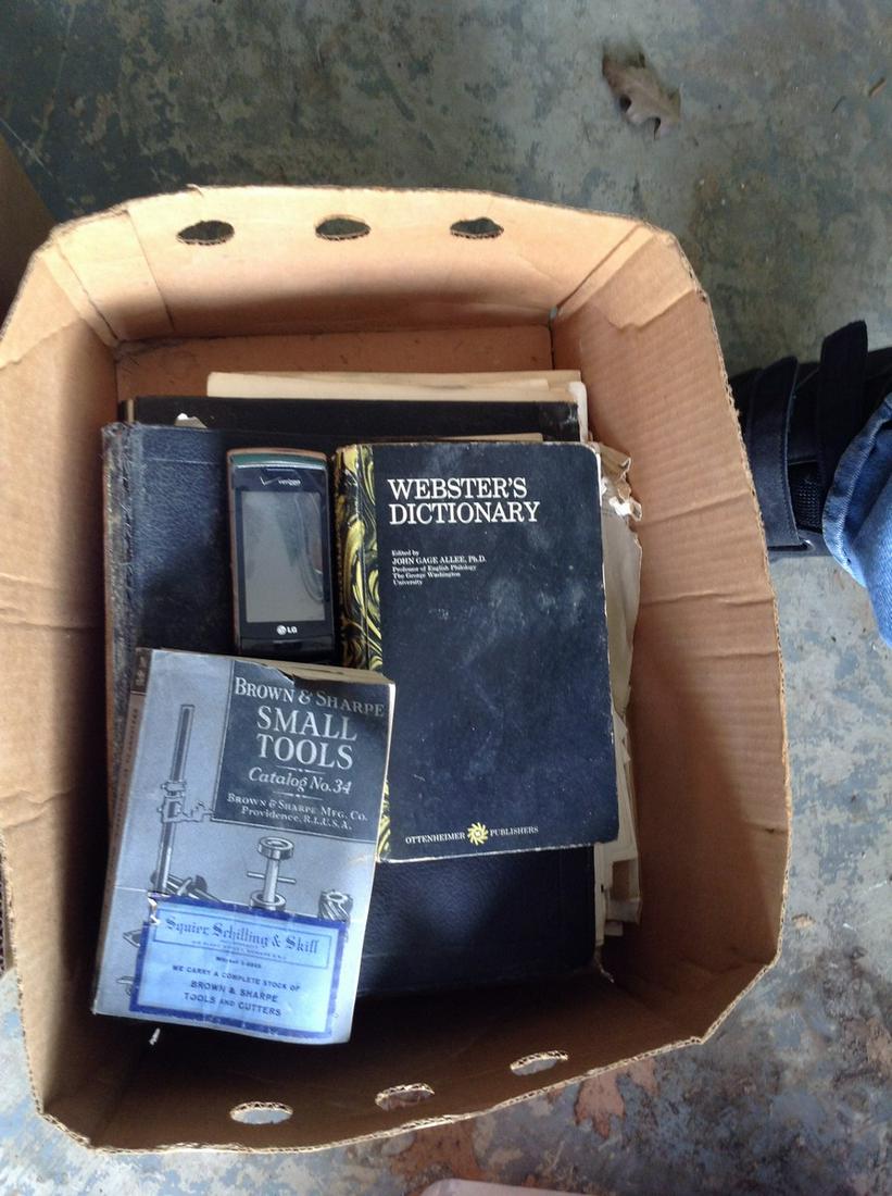 Box full of vintage sewing machine manuals: Box full of vintage sewing machine manuals