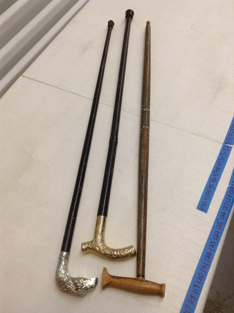 Lot of three vintage walking canes - hand carved & (1 of 1)