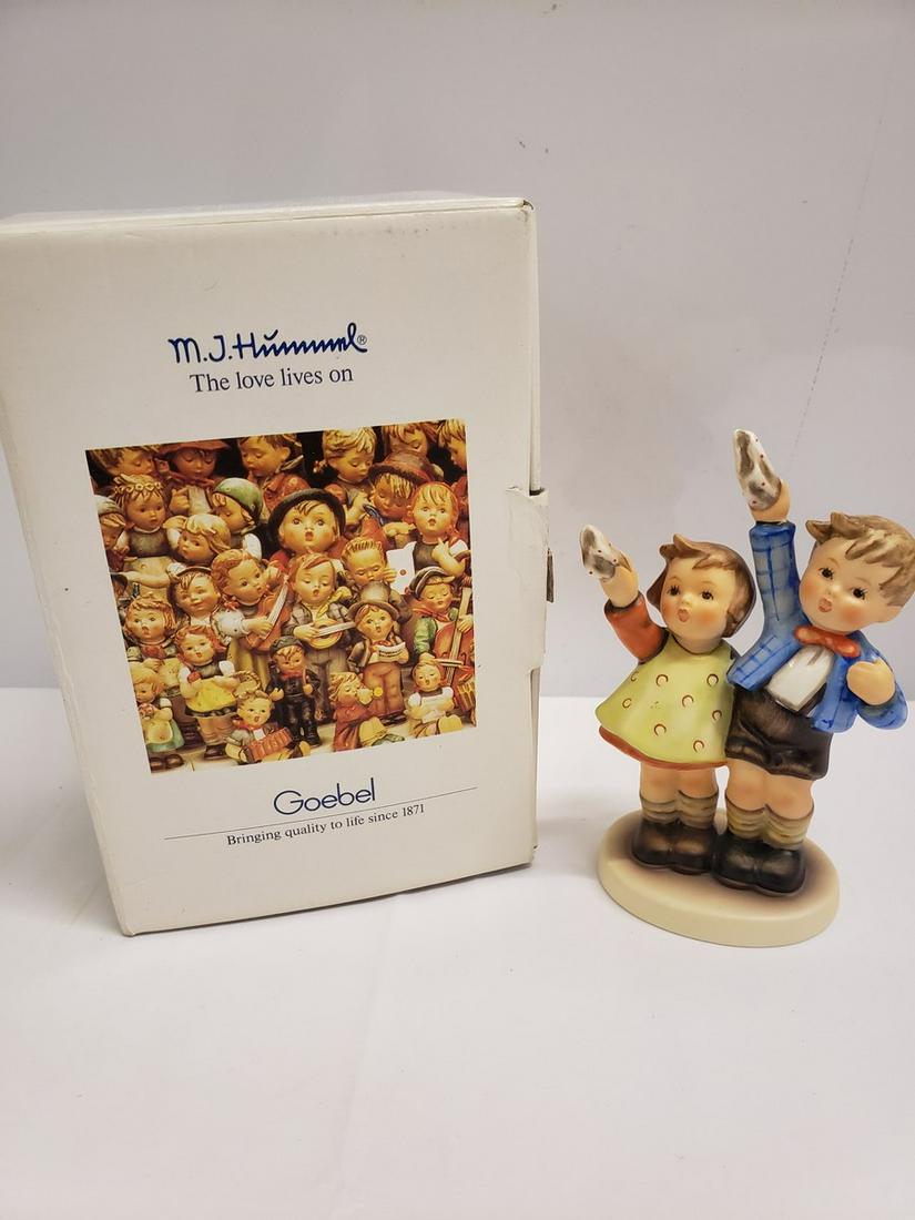 Hummel boy and girl playing statue new in box: Hummel boy and girl playing statue new in box