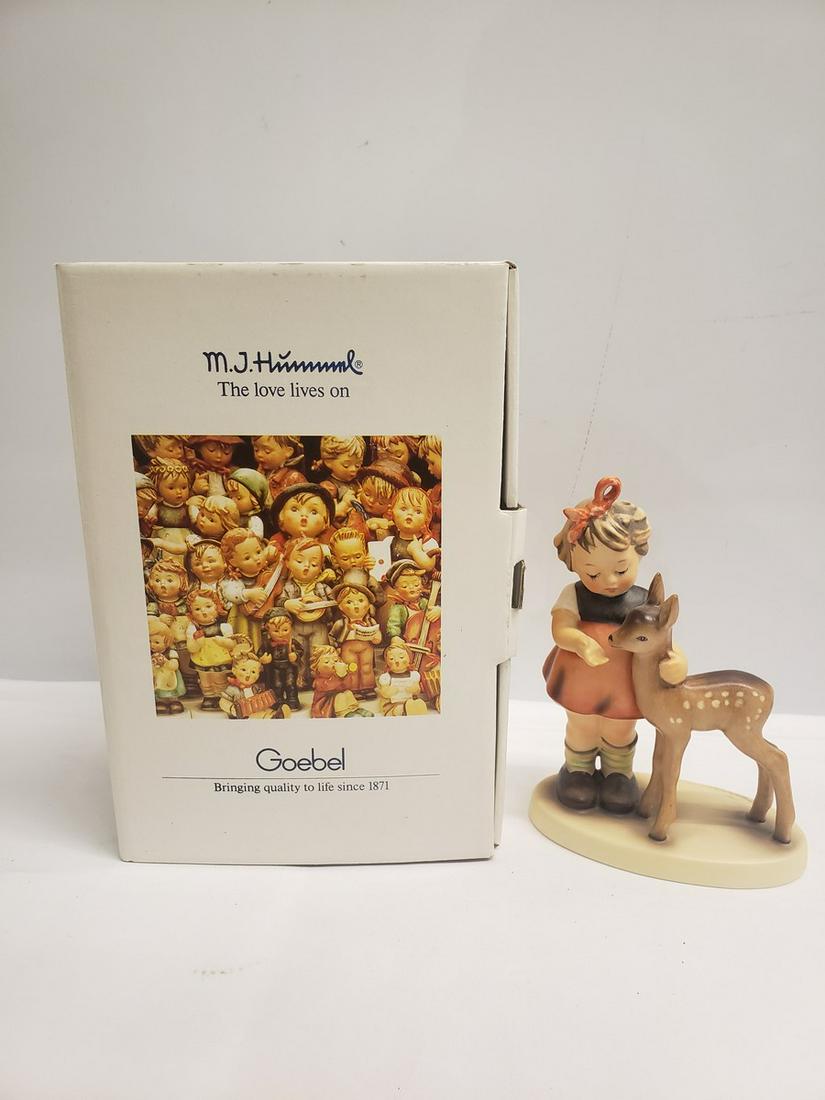 Hummel girl with fawn figure new in box: Hummel girl with fawn figure new in box