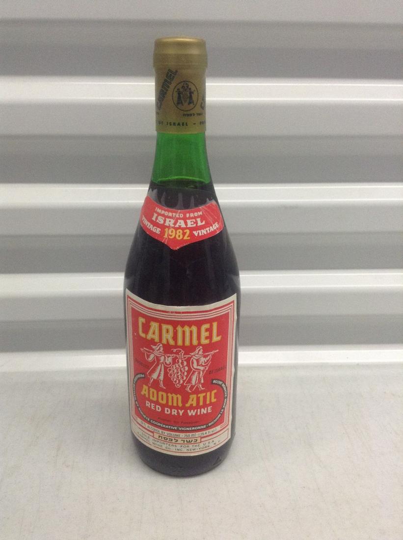 1982 Carmel Adom Atik Israeli Wine: Any contents in bottle is Free; You are bidding on the bottle & unbroken tax stamp