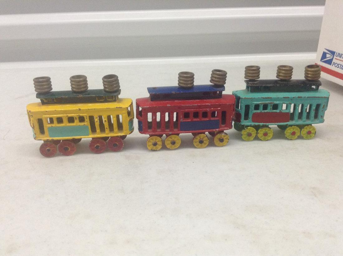 Lot of Three Painted Toy Train Cars (1 of 1)