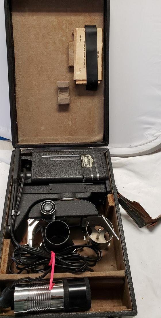 Vintage Tri-Purpose SVE Projector Model AAA with: Vintage Tri-Purpose SVE Projector Model AAA with original carrying case and manual -we did not test this item