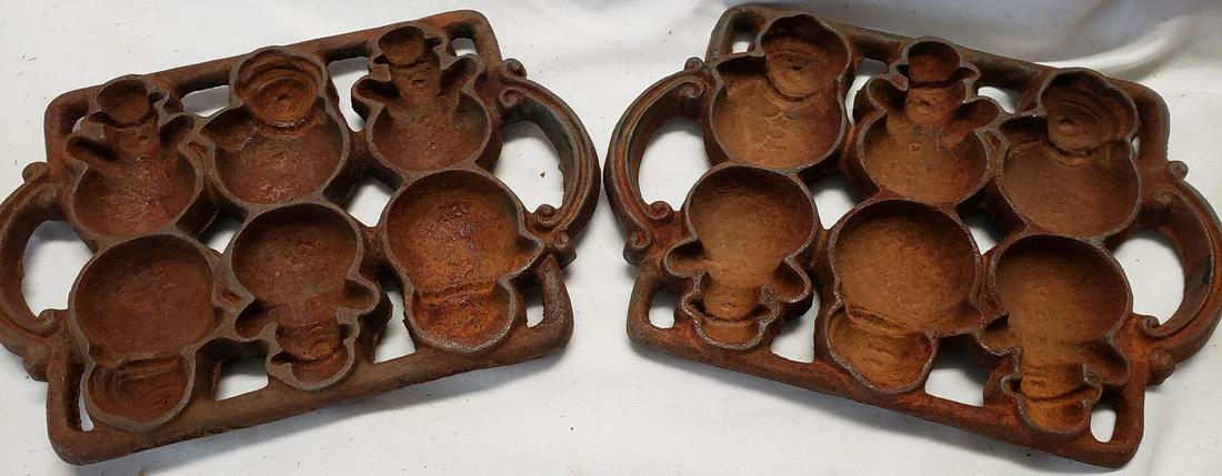 Two heavy cast iron snowman molds (1 of 1)